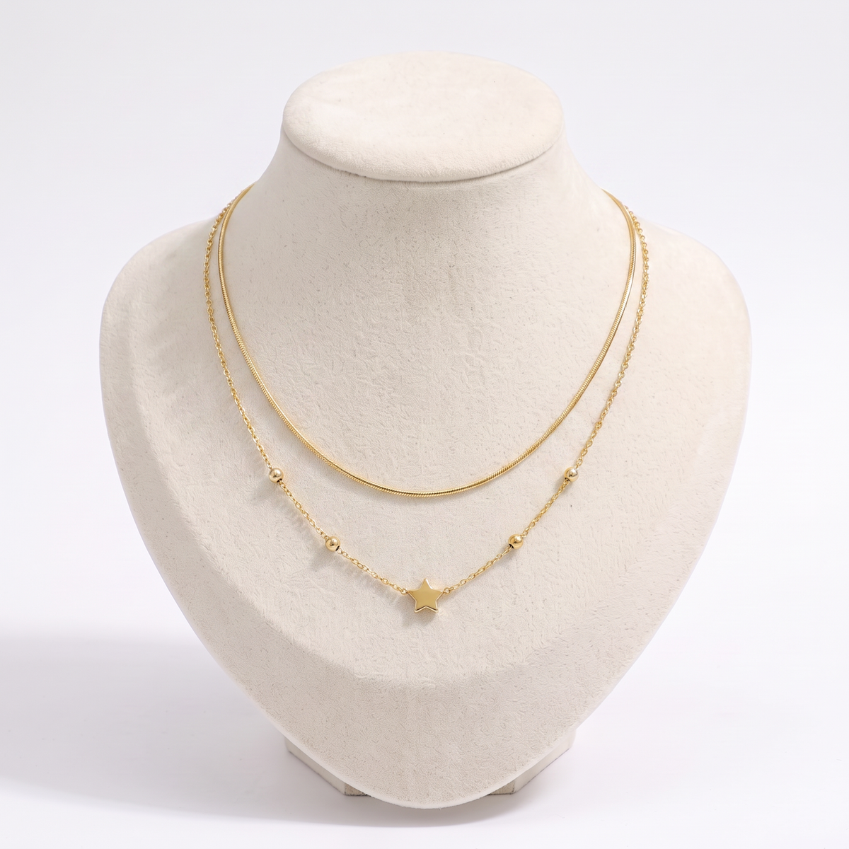 Collier étoile minimaliste double rang, vue de face, doré
