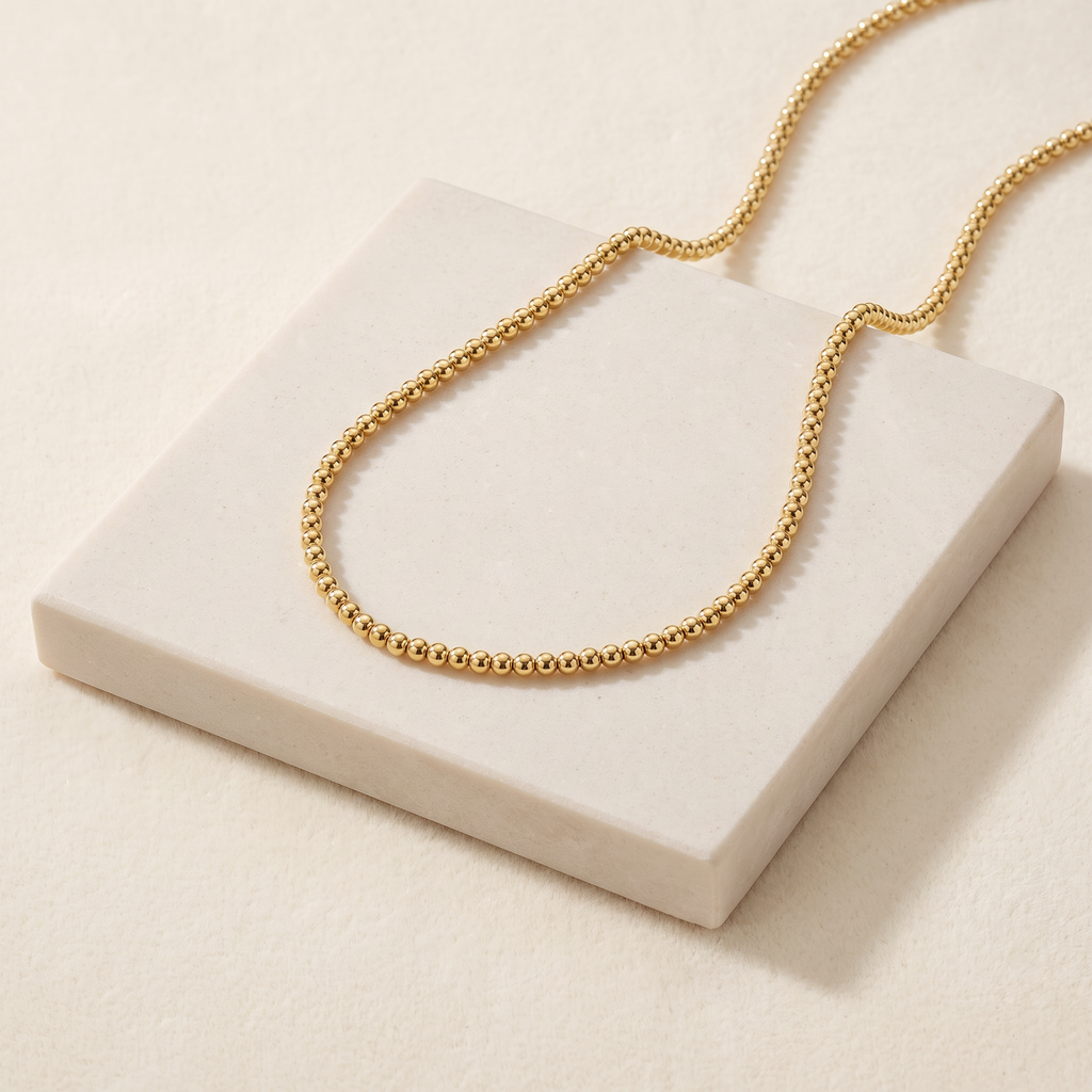 Collier ras de cou à boules 4 mm — Doré