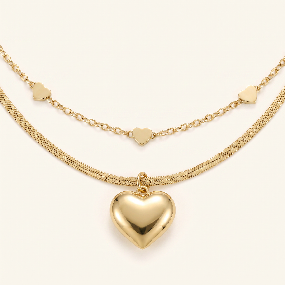 Collier cœur double rang, détail du motif, doré