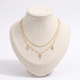 Collier croix double rang, vue de face, doré