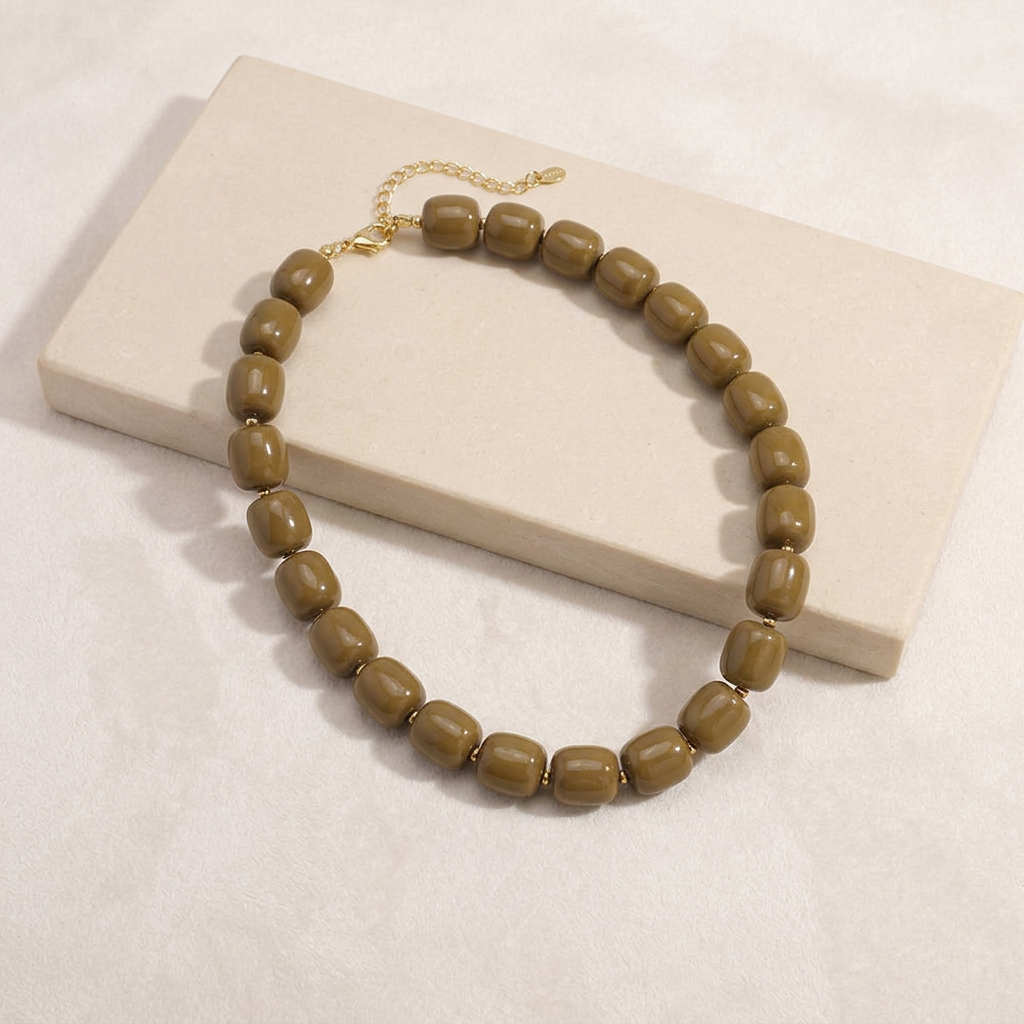 Collier de perles doré — Marron