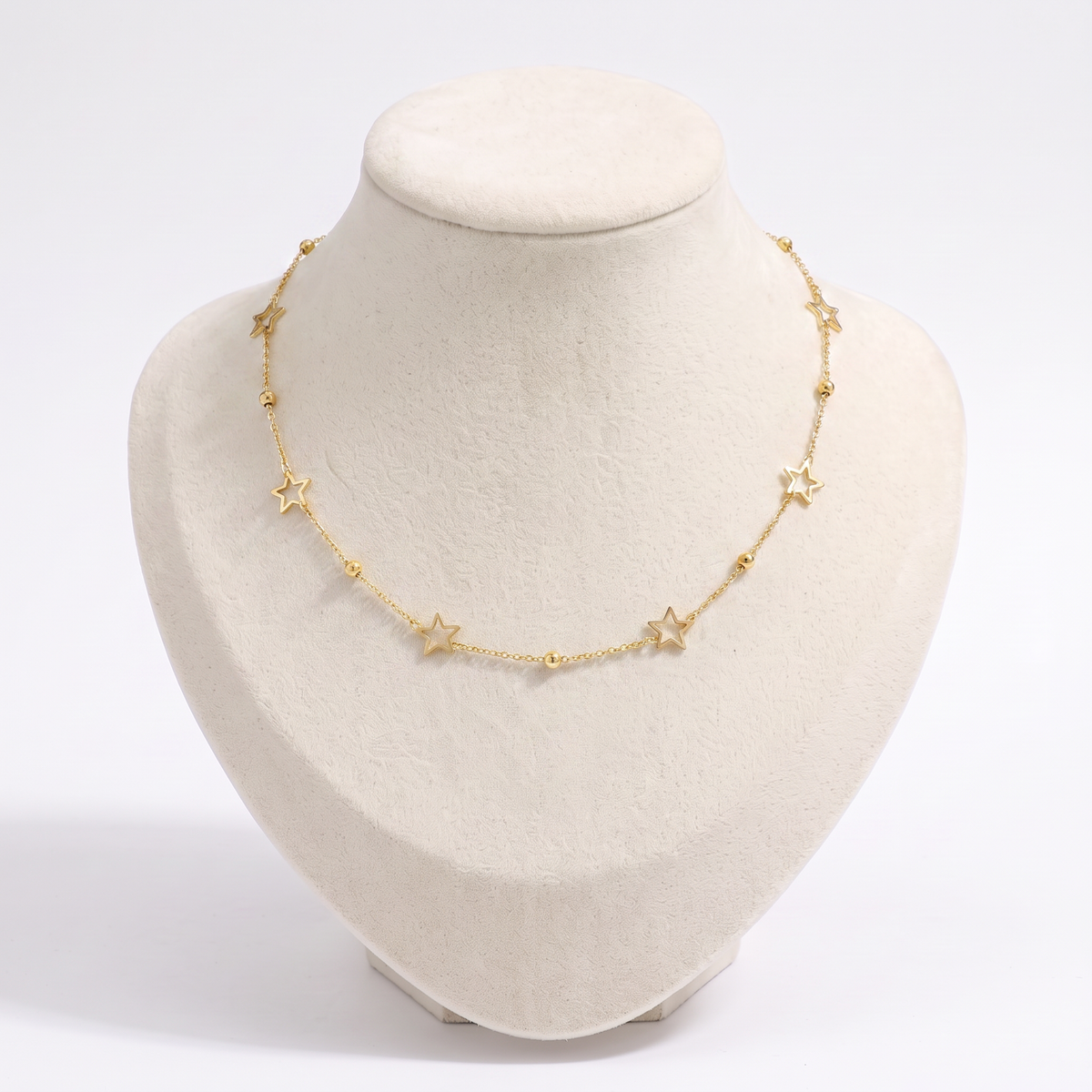 Collier ras de cou étoile, vue de face, doré