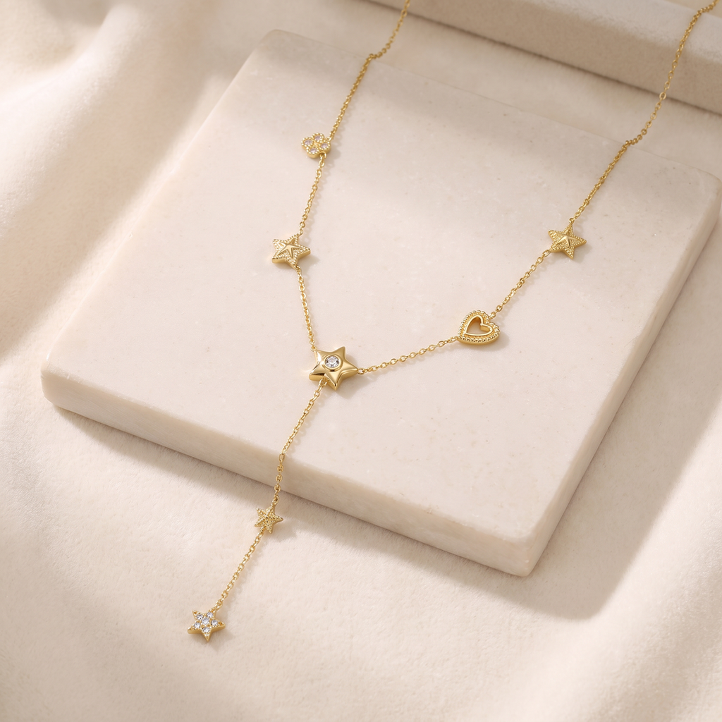Collier cœur et étoile à strass — Doré