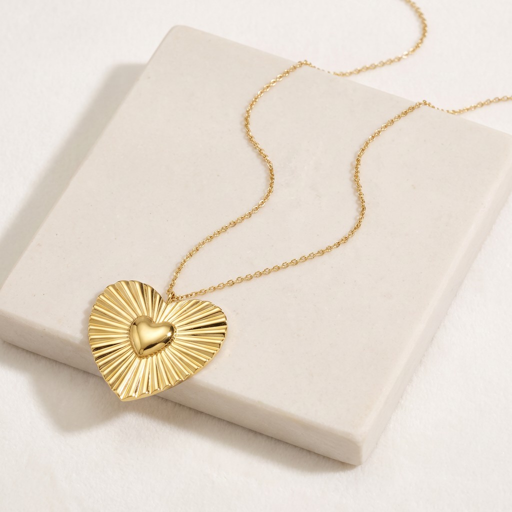 Collier cœur doré rayonnant — Doré