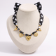 Collier cœur doré à pois sur cordon tressé, vue de face