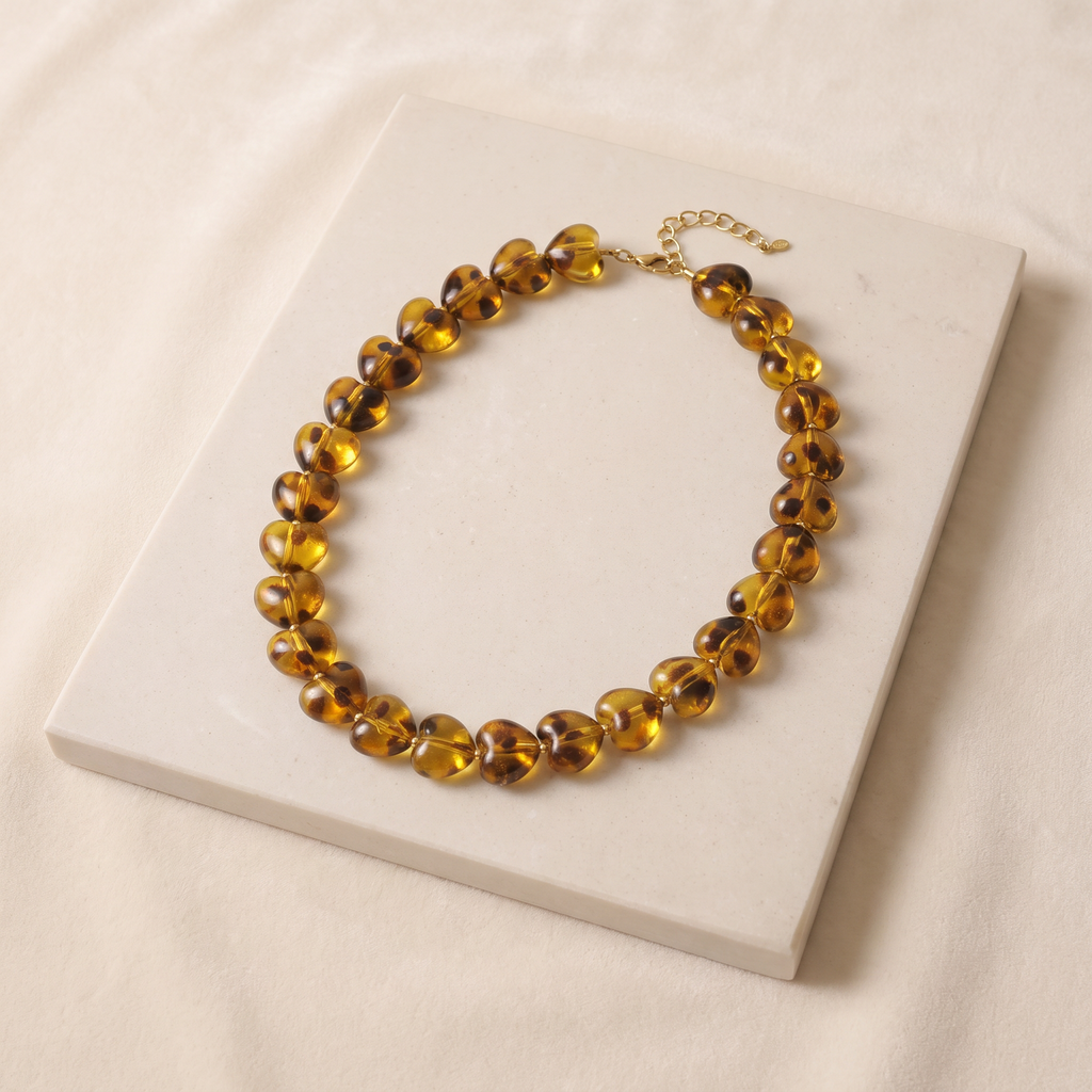 Collier cœur façon léopard en perles — Marron
