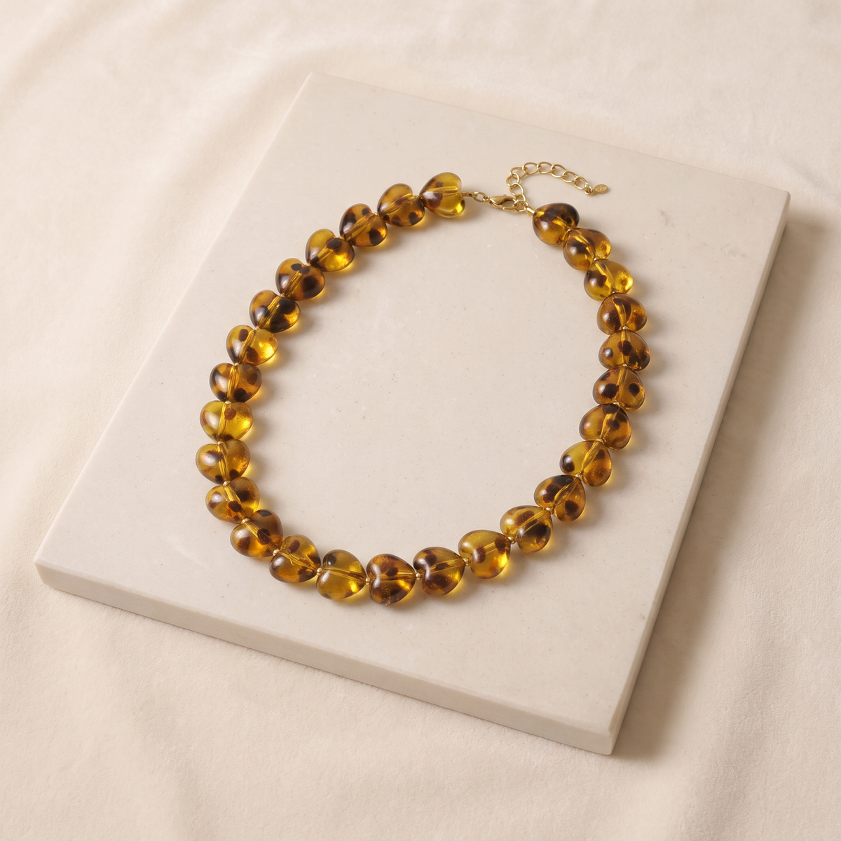 Collier cœur façon léopard en perles — Marron