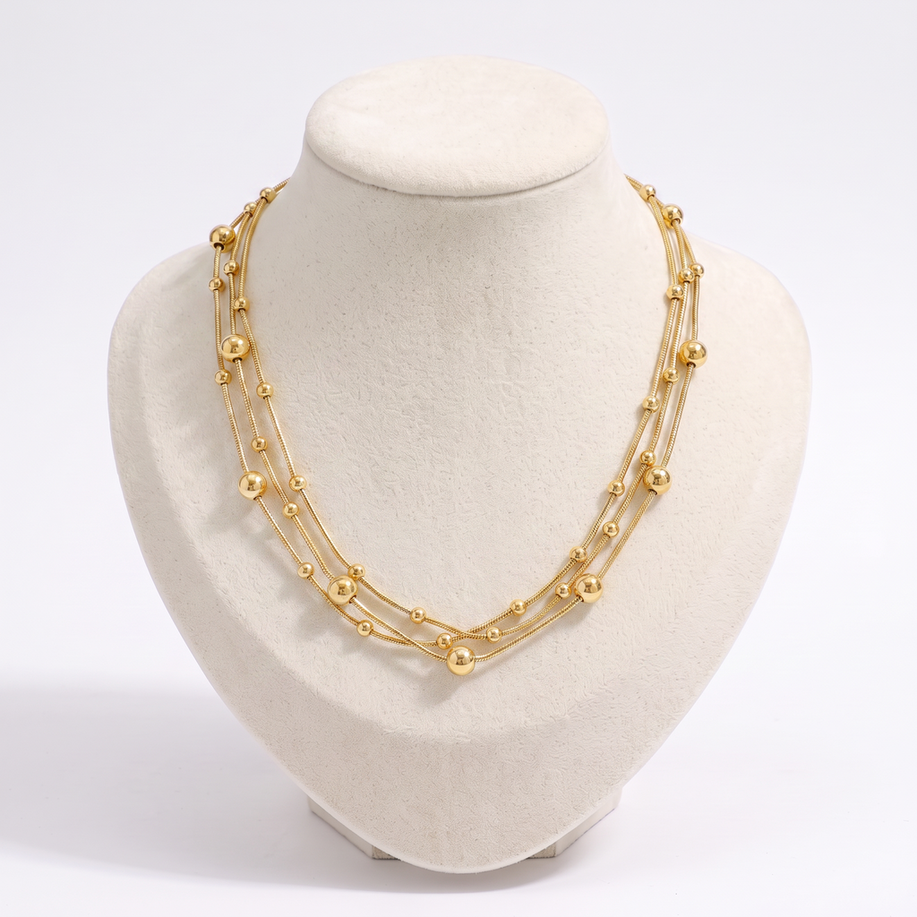 Collier serpent à boules en multirang, vue de face, doré