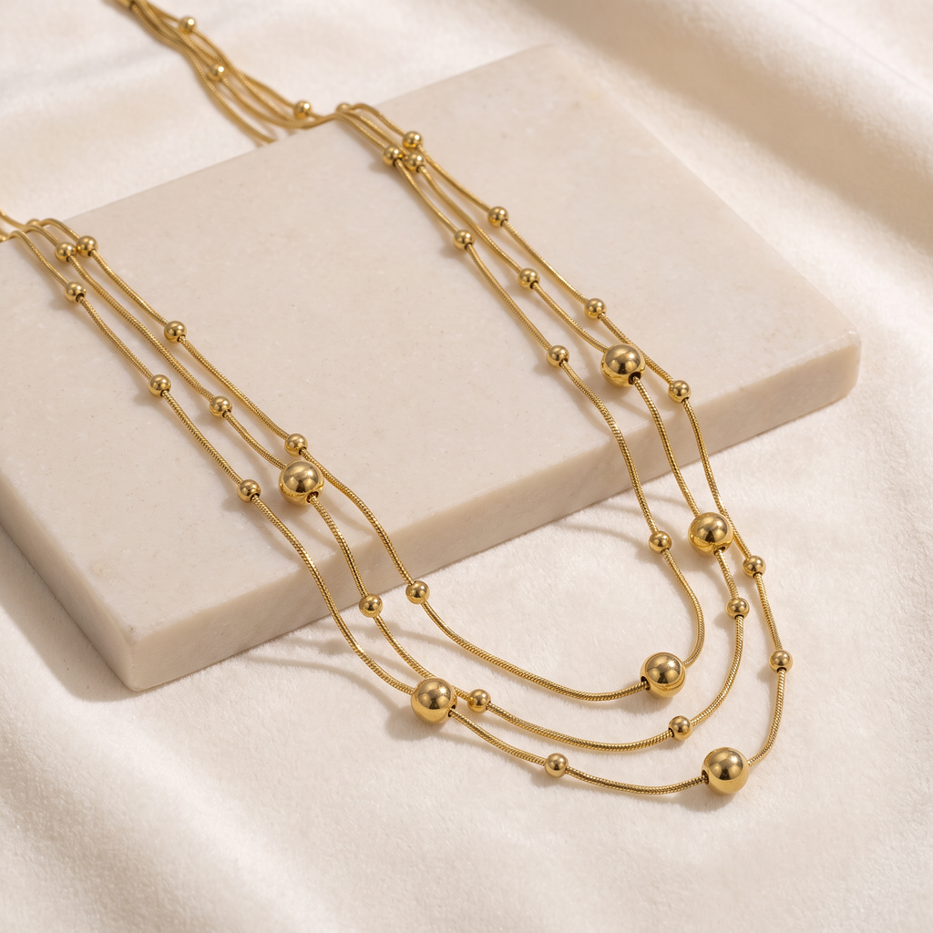 Collier serpent à boules en multirang — Doré