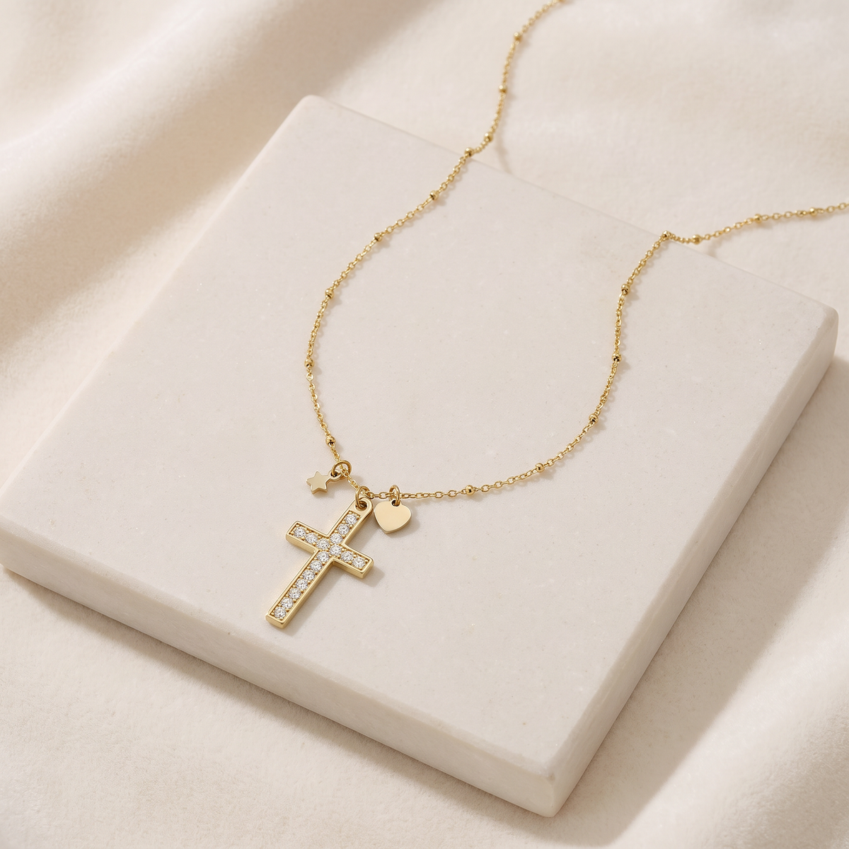 Collier croix, cœur et étoile à strass — Doré