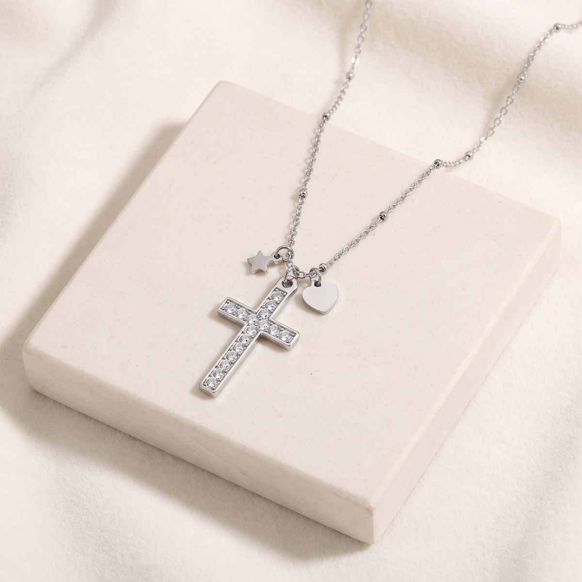 Collier croix, cœur et étoile à strass — Argenté