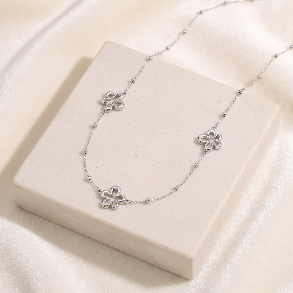 Collier charms fleur à motif ajouré — Argenté