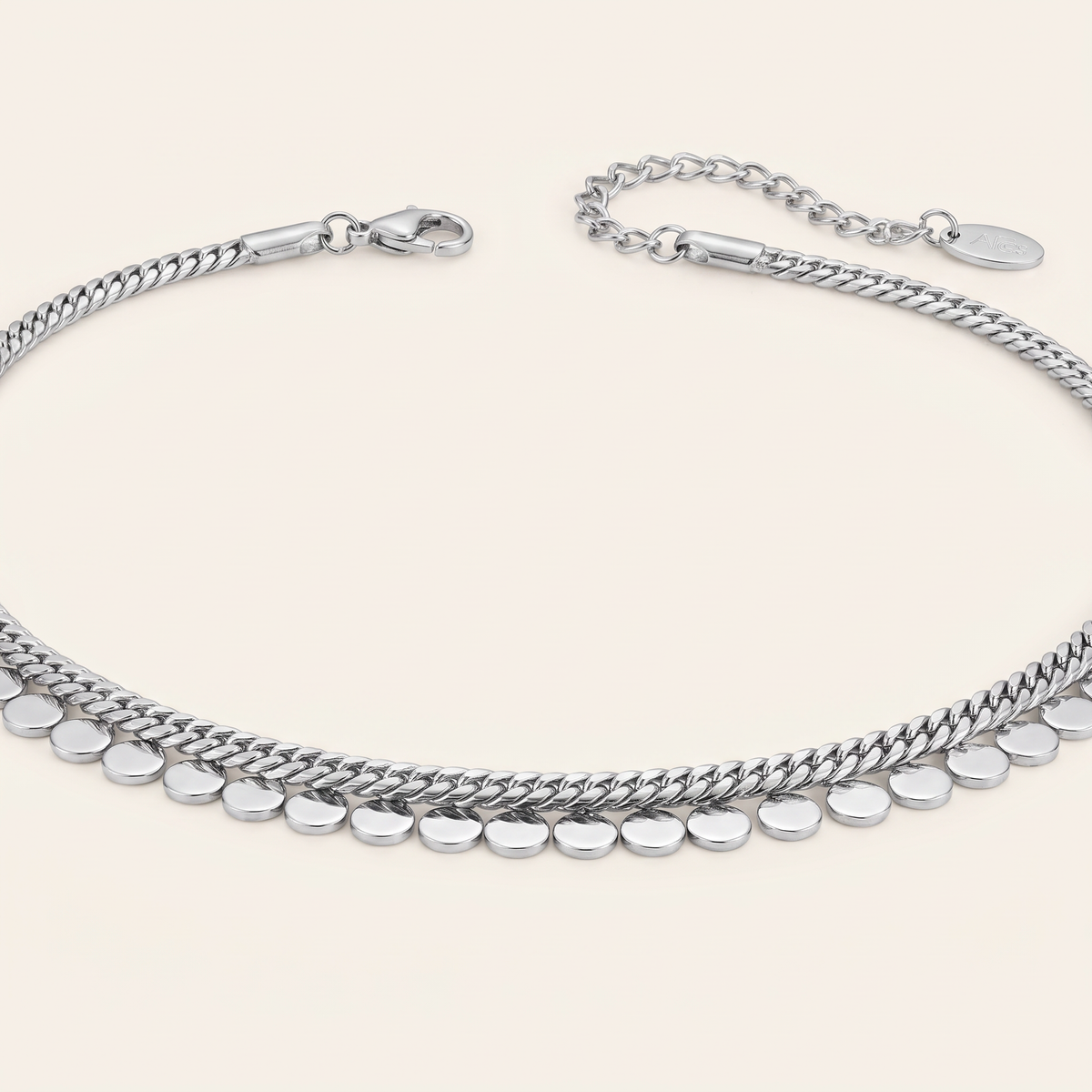Collier ras de cou tressé à pois, détail du motif, argenté