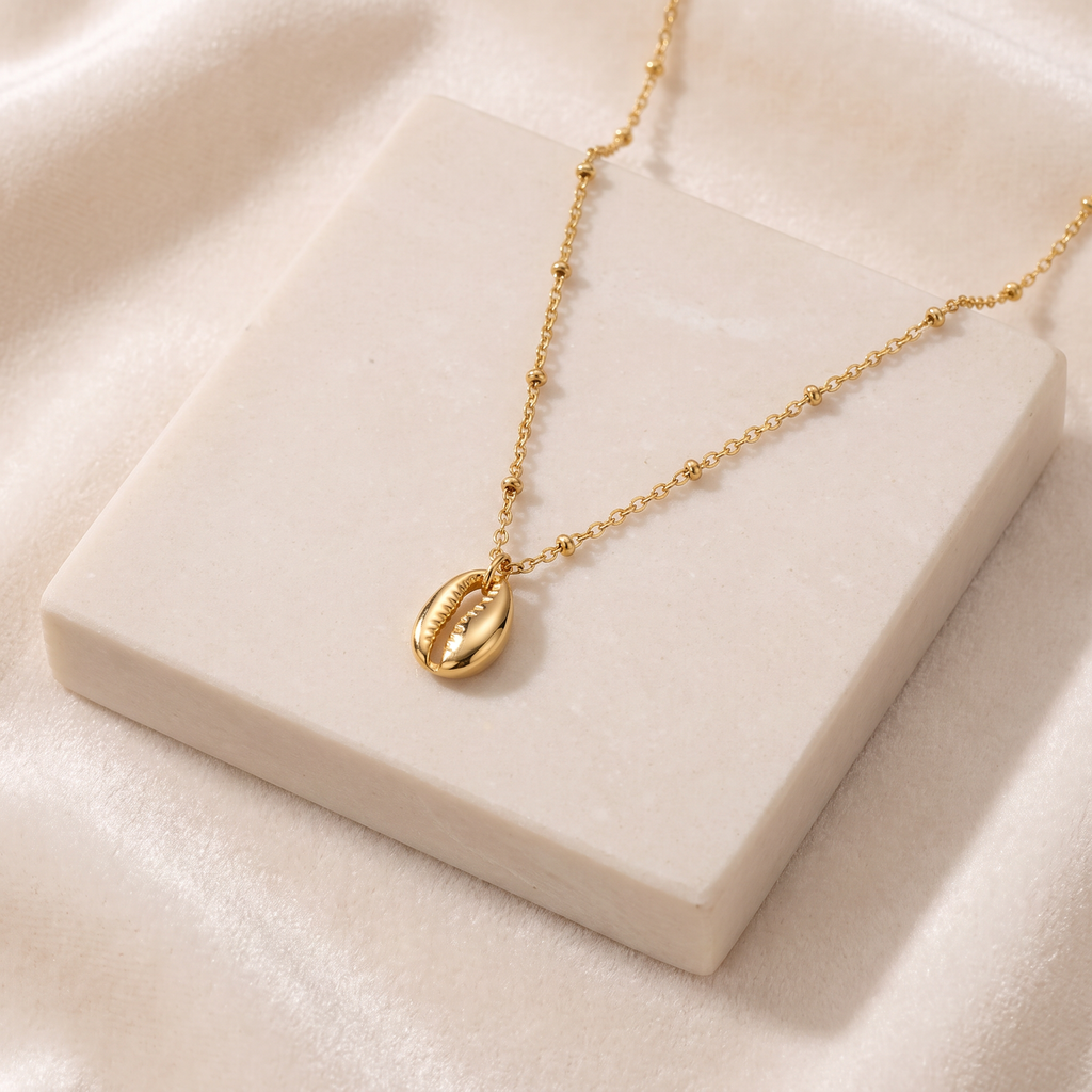Collier cauri minimaliste — Doré