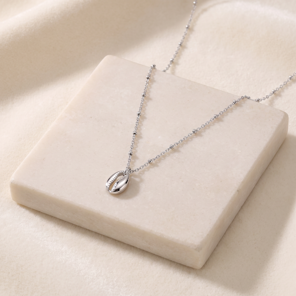 Collier cauri minimaliste — Argenté