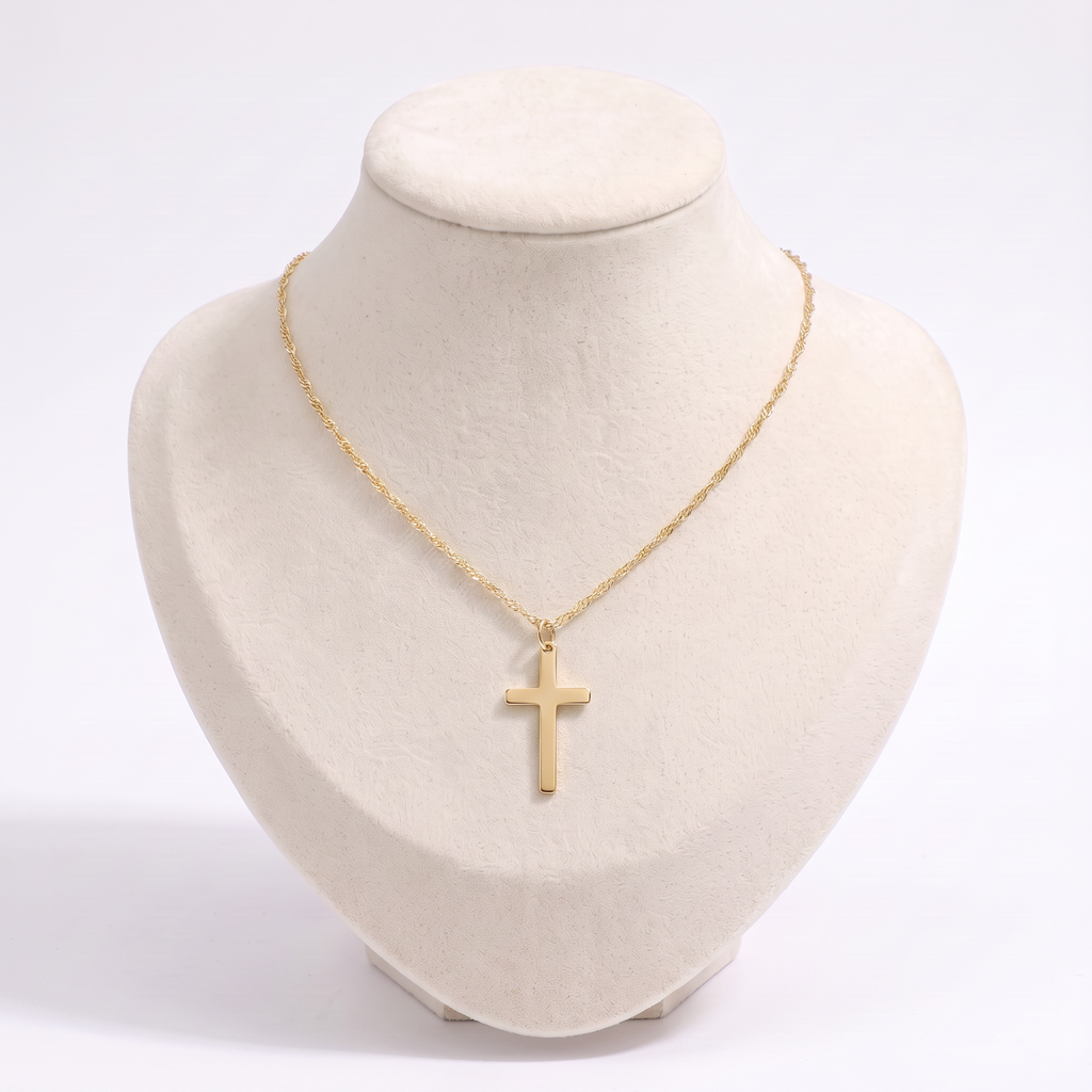 Collier croix minimaliste, vue de face, doré