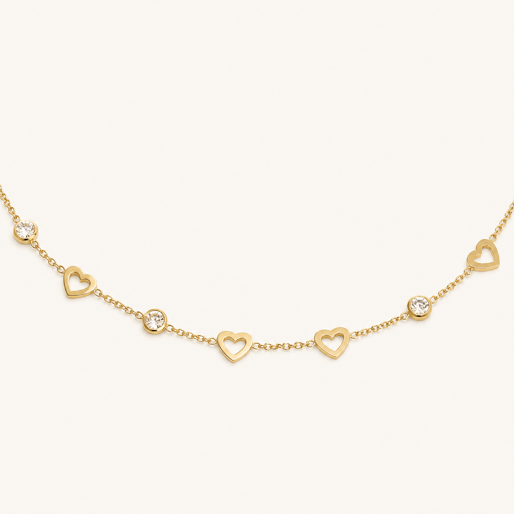 Collier cœur maille fine à strass, détail du motif, doré