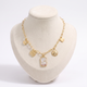 Collier charms lune et soleil en émail, vue de face, doré