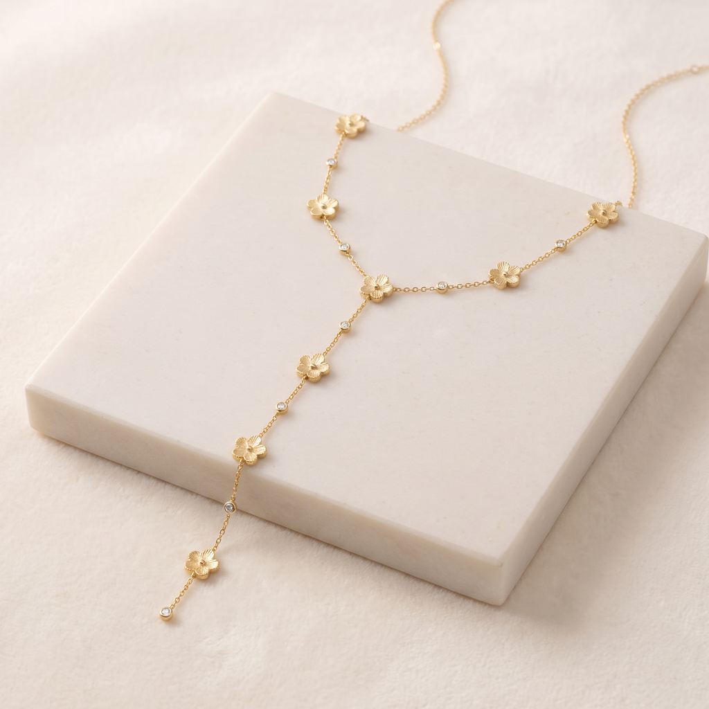 Collier marguerite à strass — Doré