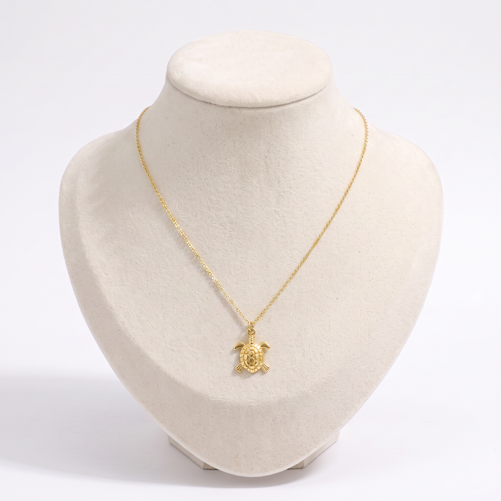 Collier tortue maille fine, vue de face, doré