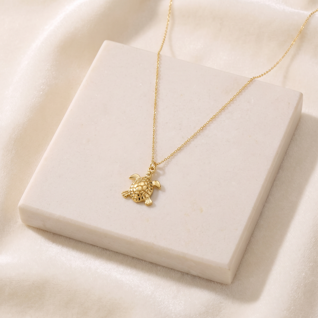 Collier tortue maille fine — Doré