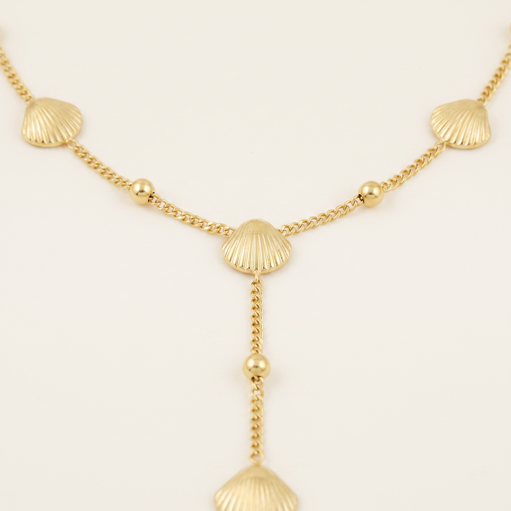 Collier pendentif en cascade, détail du motif, doré