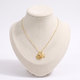 Collier étoile de mer et coquillage, vue de face, doré