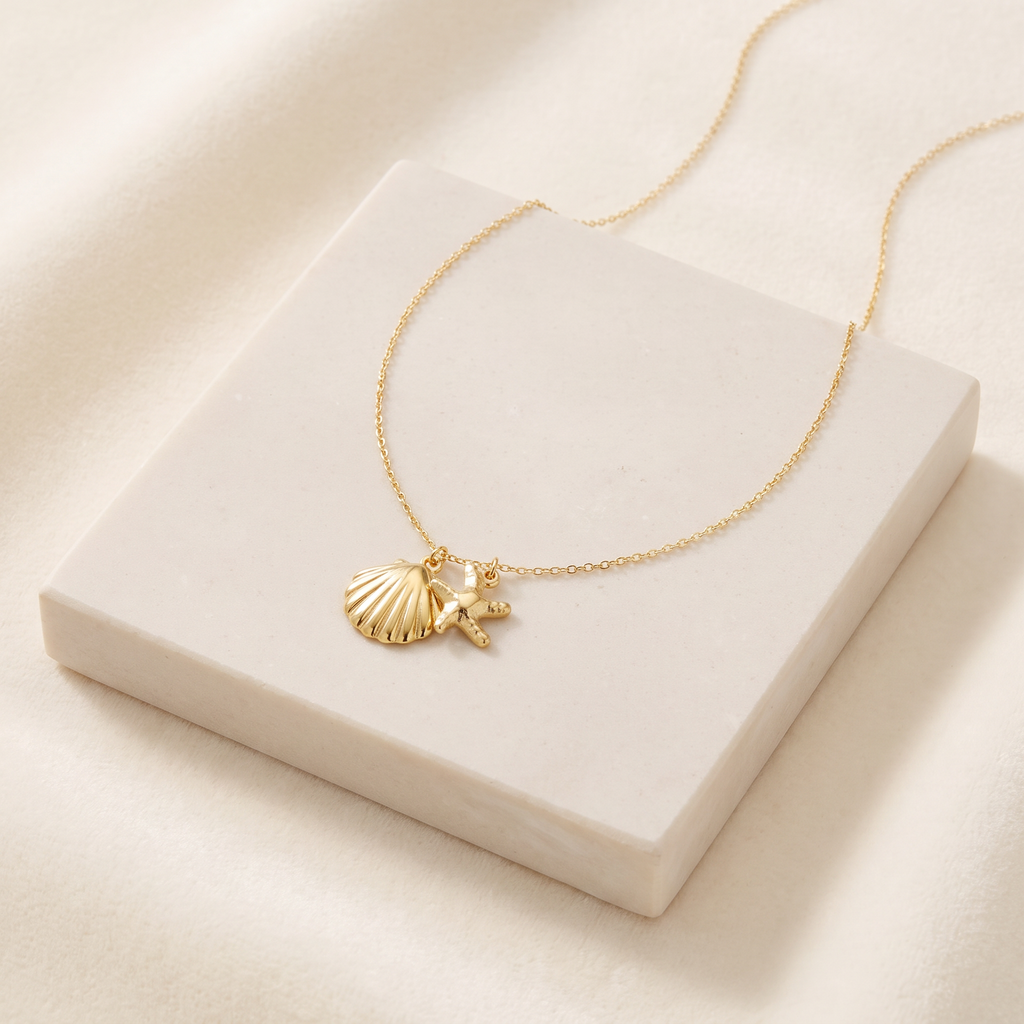 Collier étoile de mer et coquillage — Doré