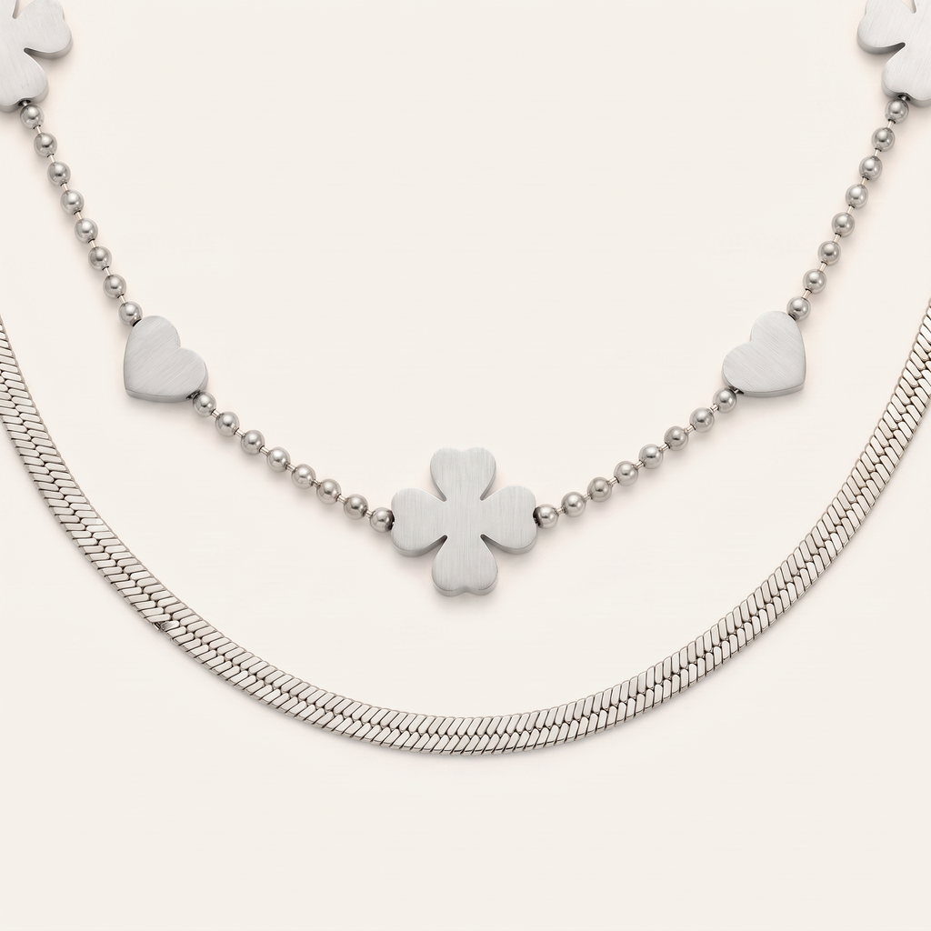 Collier cœur et trèfle double rang, détail du motif, argenté