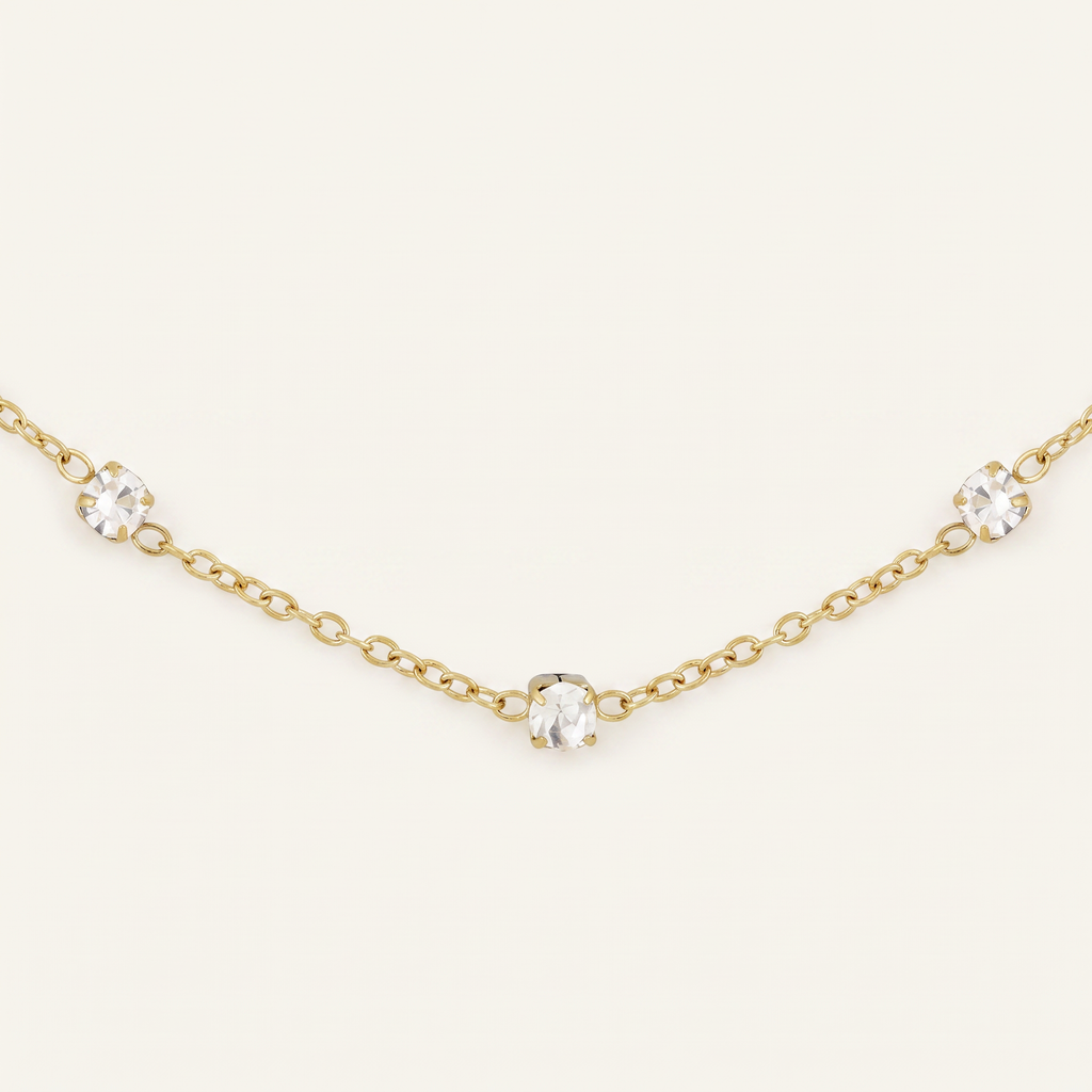 Collier chaîne à strass, détail du motif, doré
