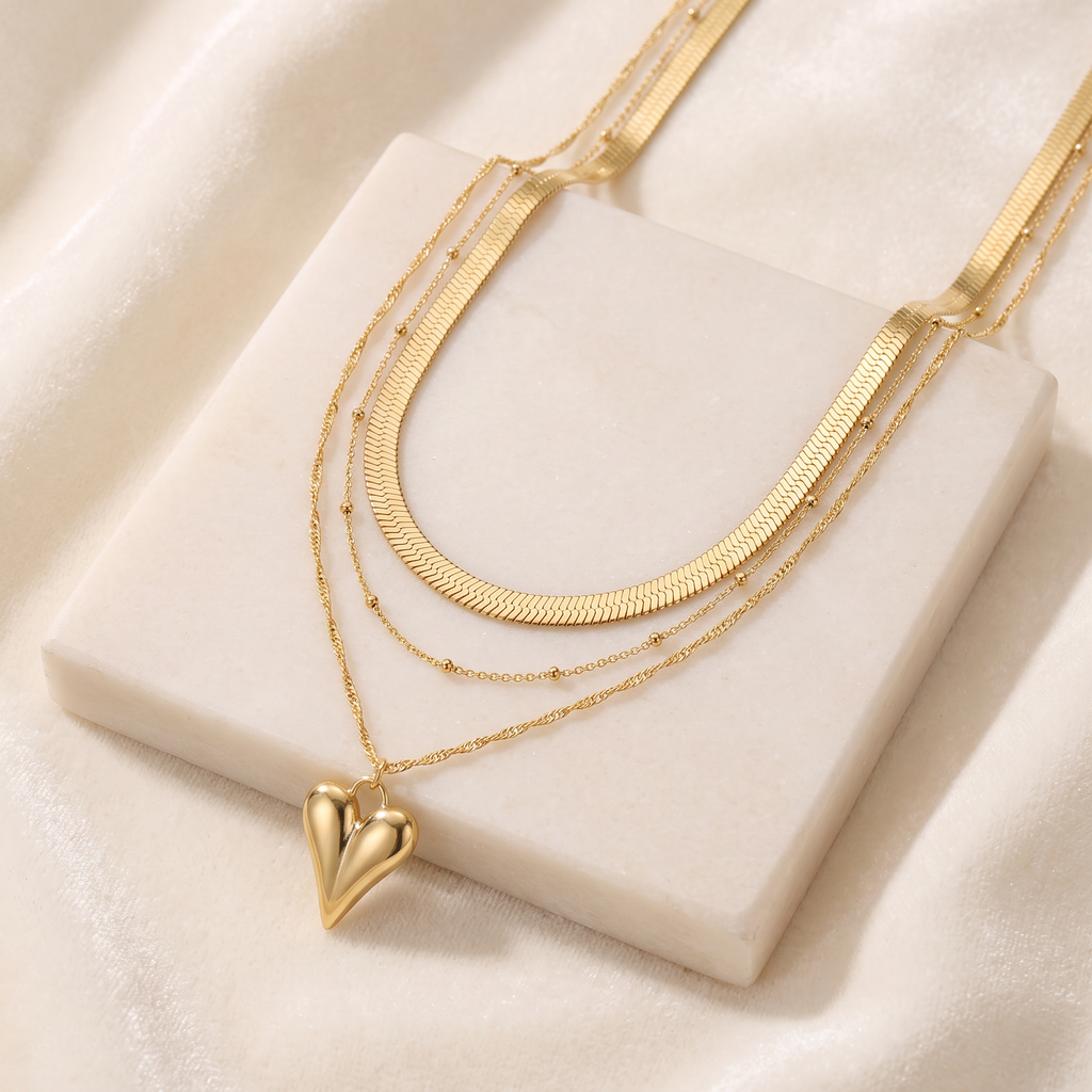 Collier cœur doré triple rang — Doré