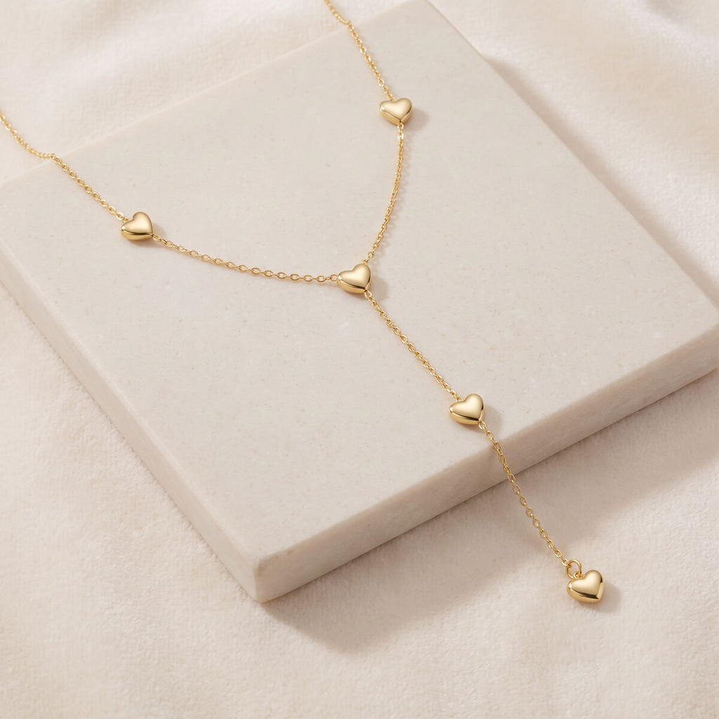 Collier cœur maille fine à motifs multiples — Doré