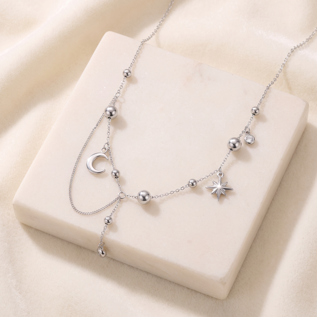 Collier étoile et lune à strass — Argenté