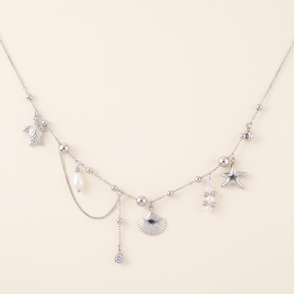 Collier charms étoile de mer effet nacré, détail du motif, argenté