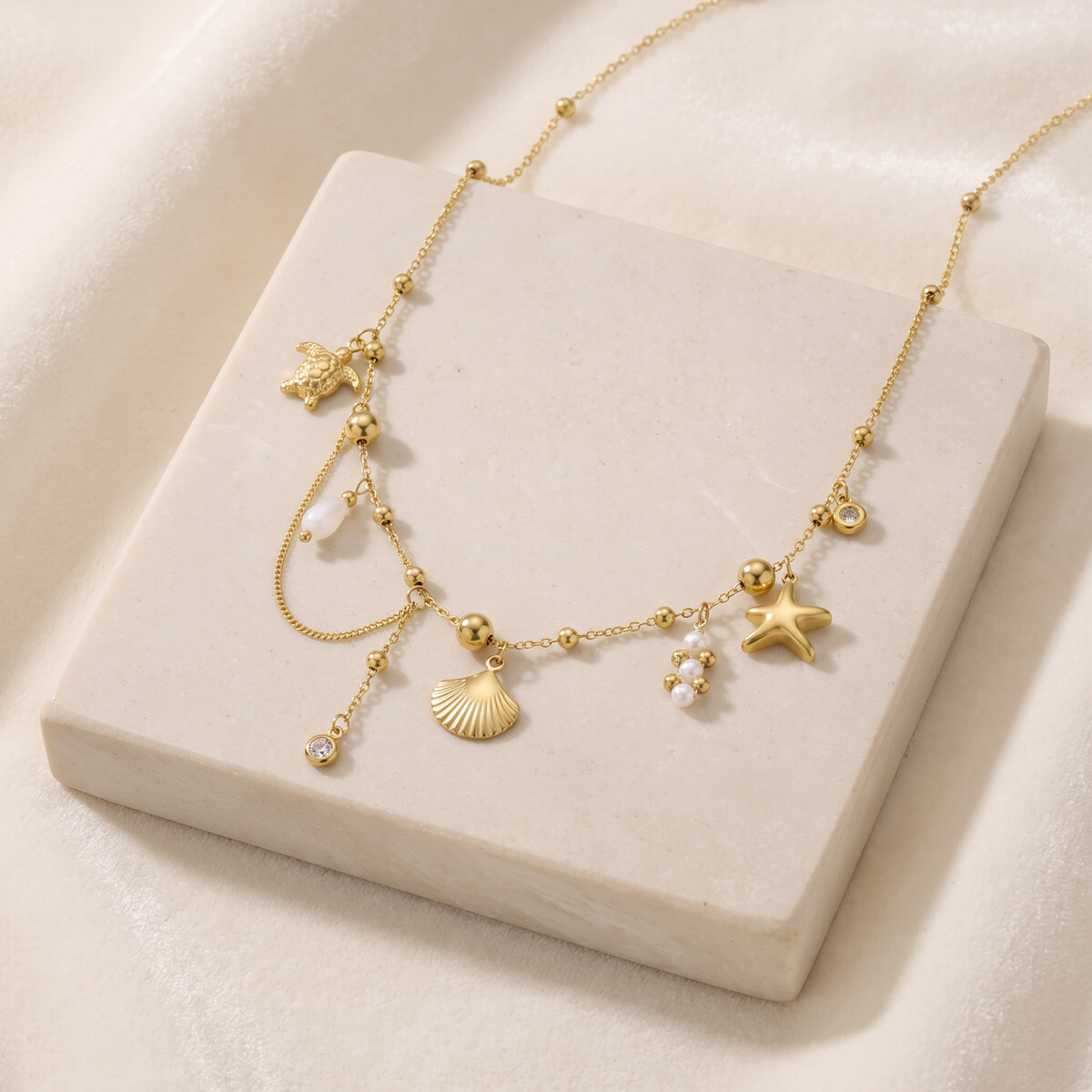 Collier charms étoile de mer effet nacré — Doré