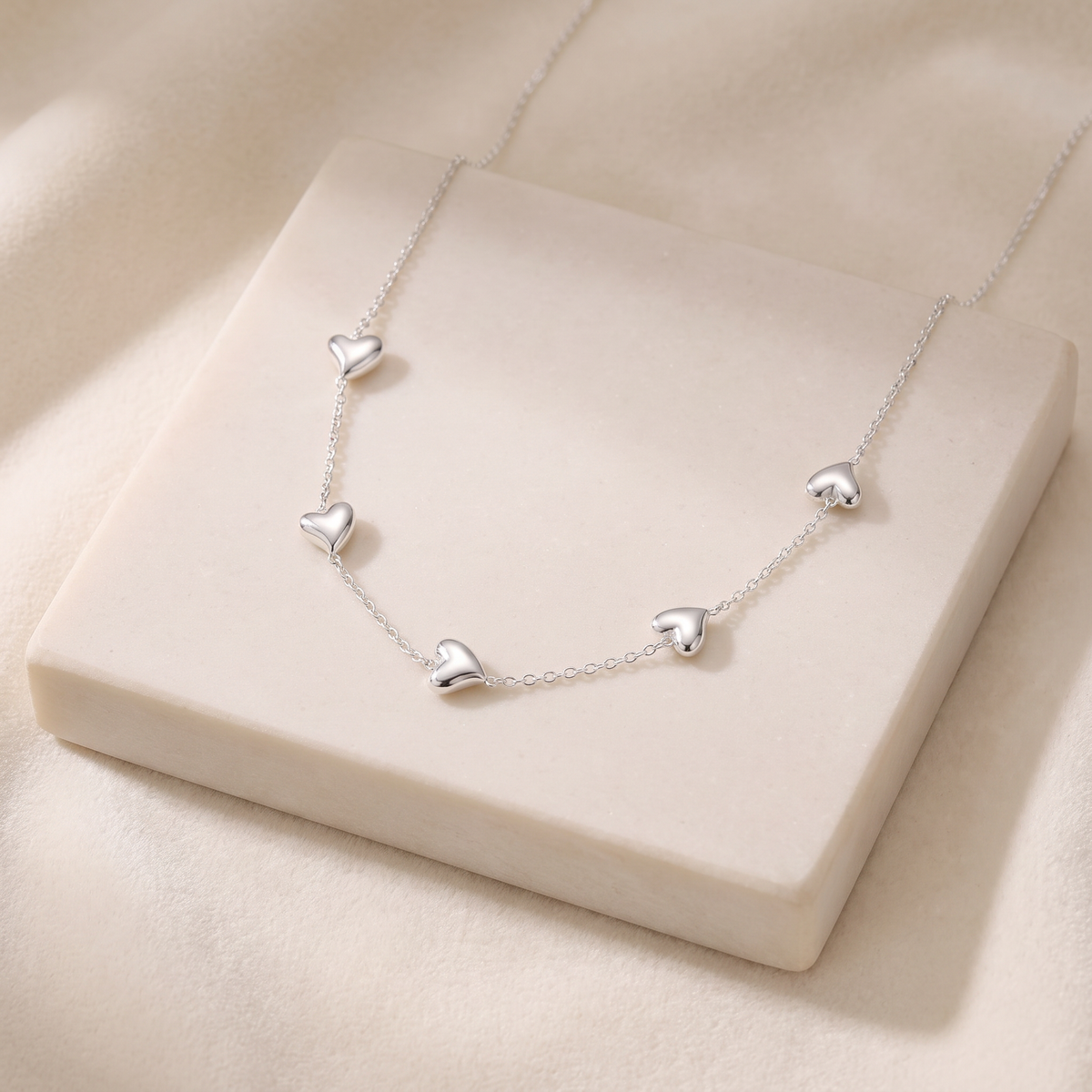 Collier cœur maille fine à motif bombé — Argenté