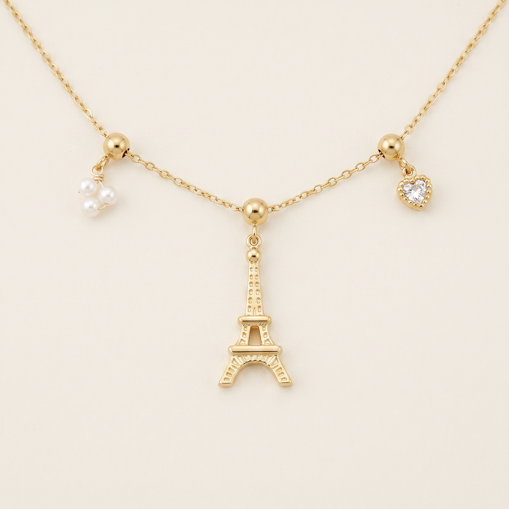Collier pendentif motif Tour Eiffel, détail du motif, doré