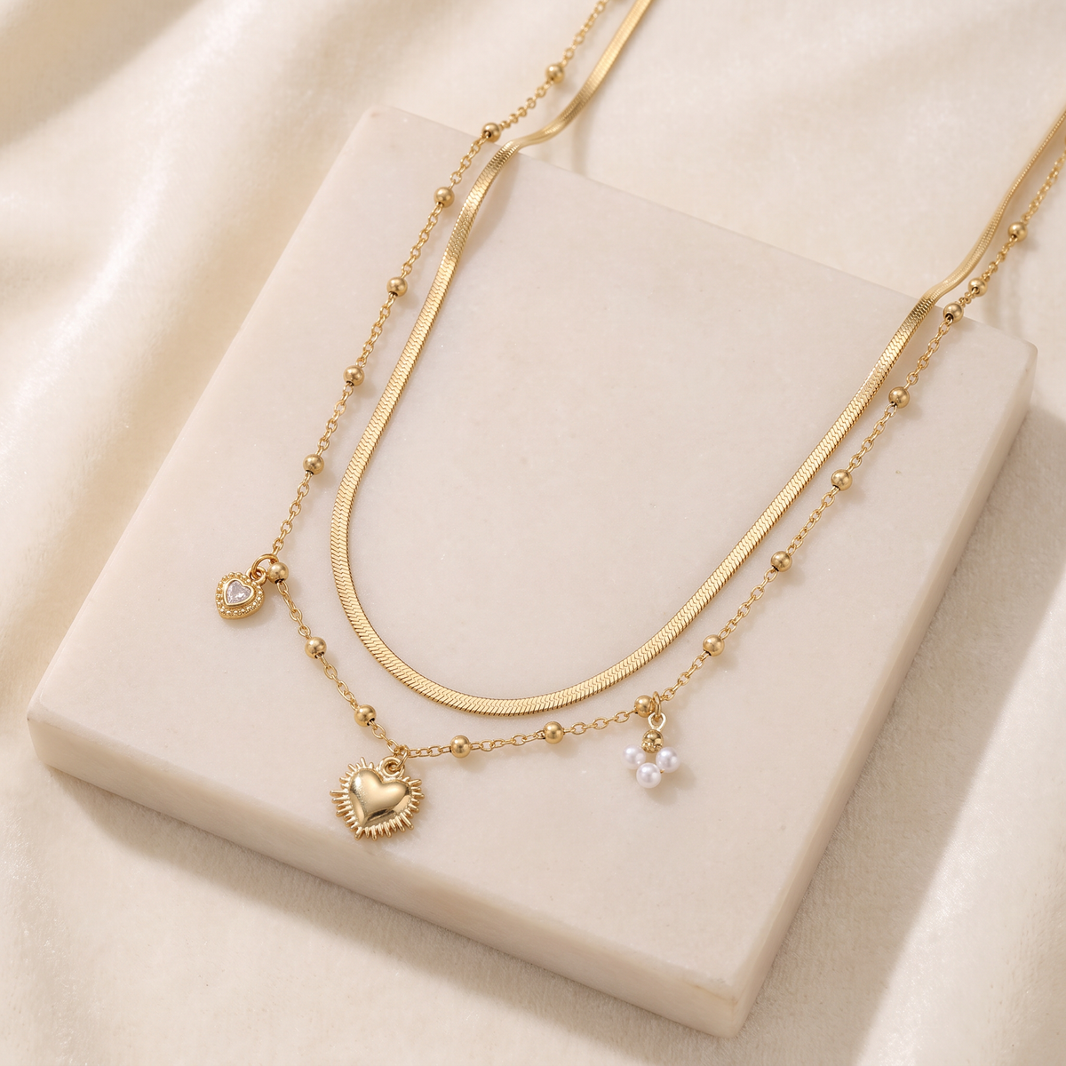 Collier cœur et breloques double rang — Doré