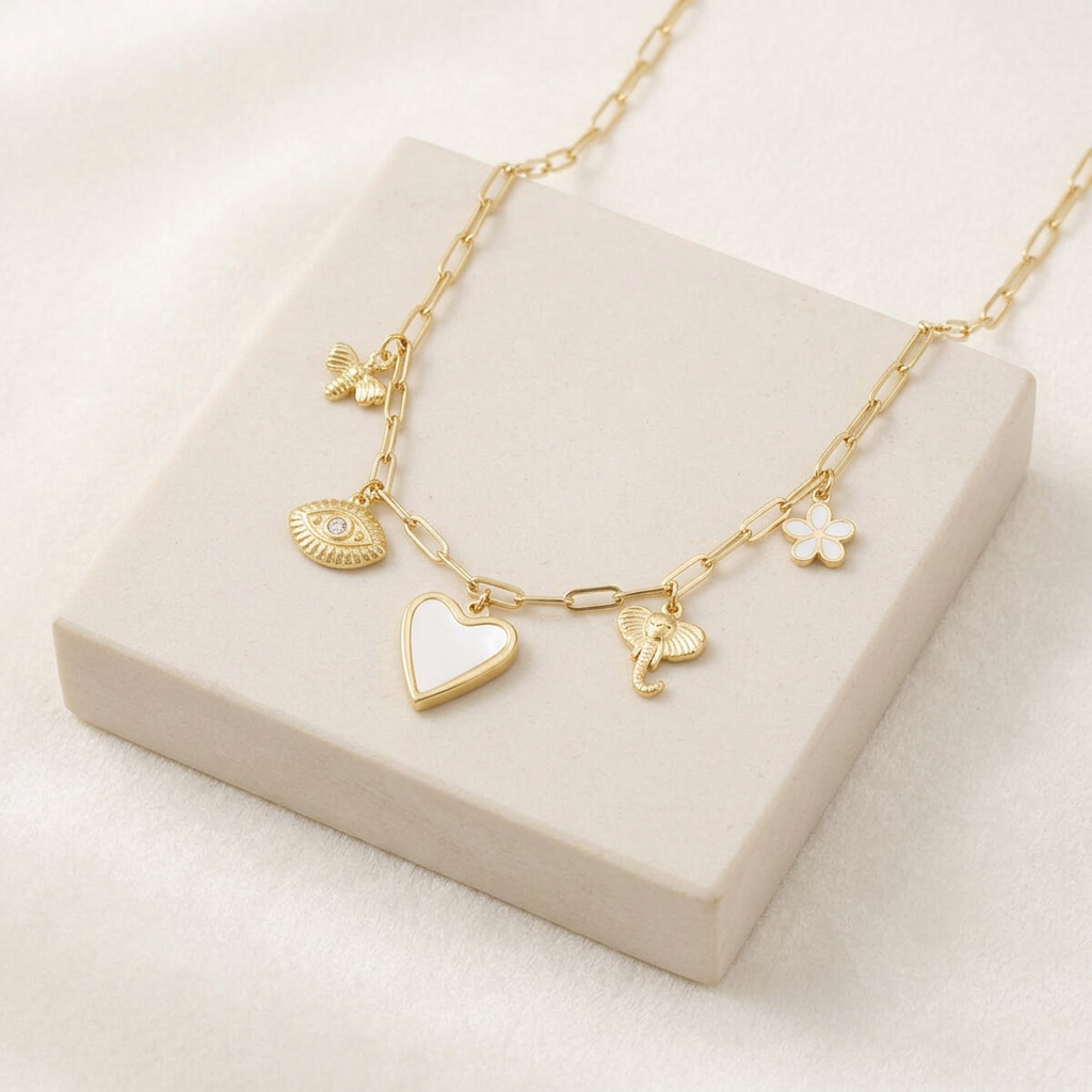 Collier charms cœur, œil et éléphant — Doré