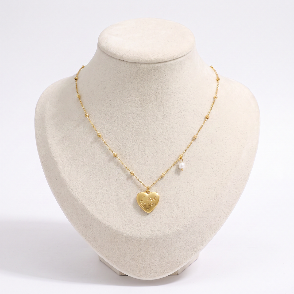 Collier cœur, vue de face, doré