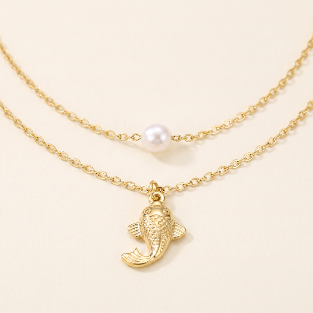 Collier poisson effet nacré double rang, détail du motif, doré