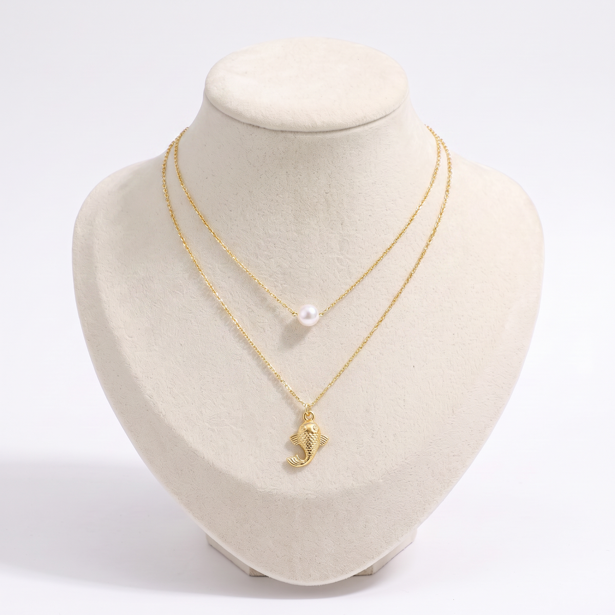 Collier poisson effet nacré double rang, vue de face, doré