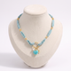 Collier cœur et étoile de mer bleu sur cordon foulard, vue de face