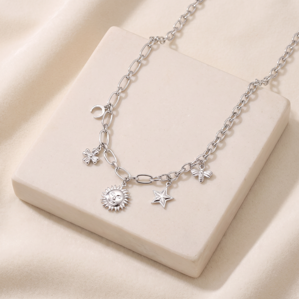 Collier charms étoile et soleil — Argenté