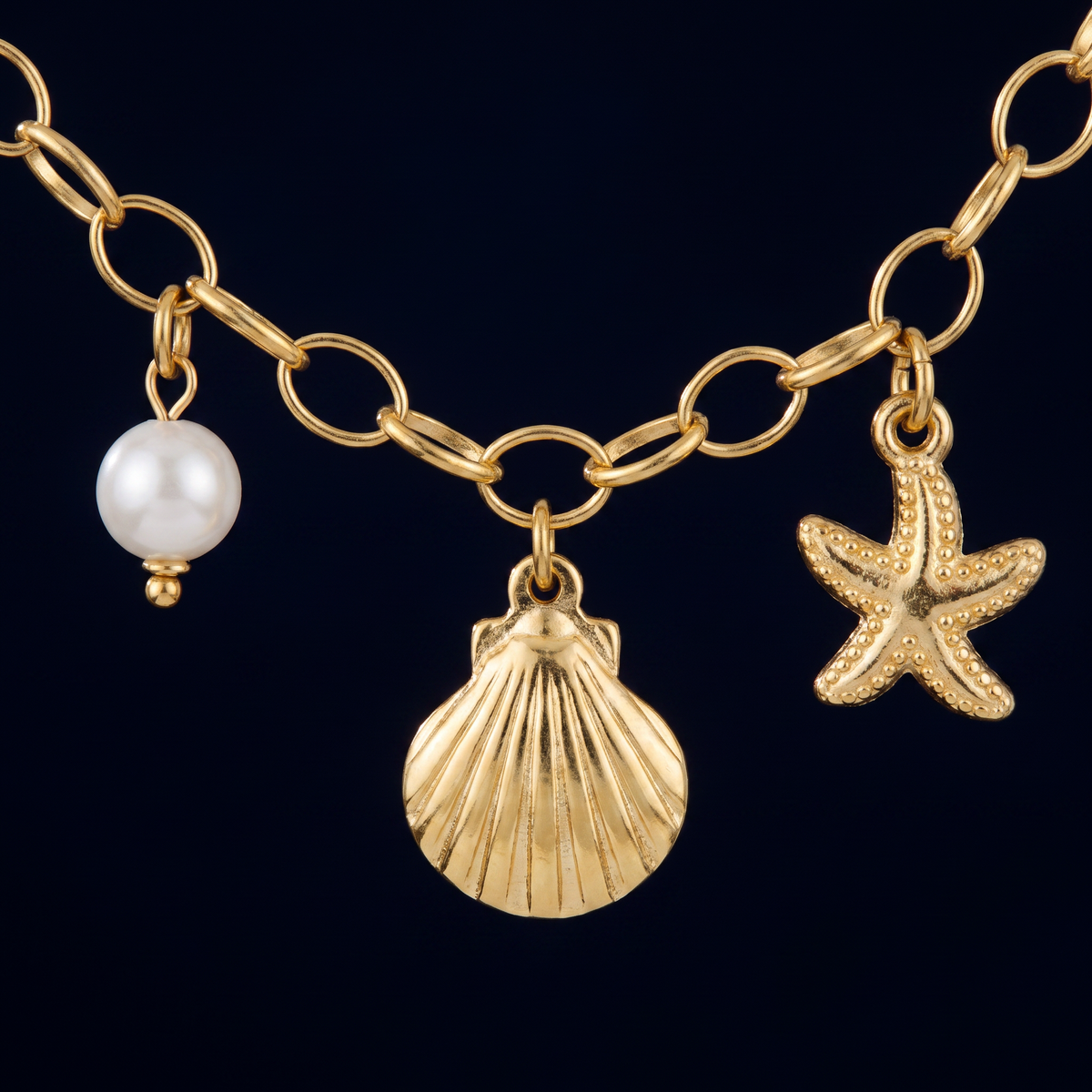 Collier coquillage grosse maille, motif en gros plan