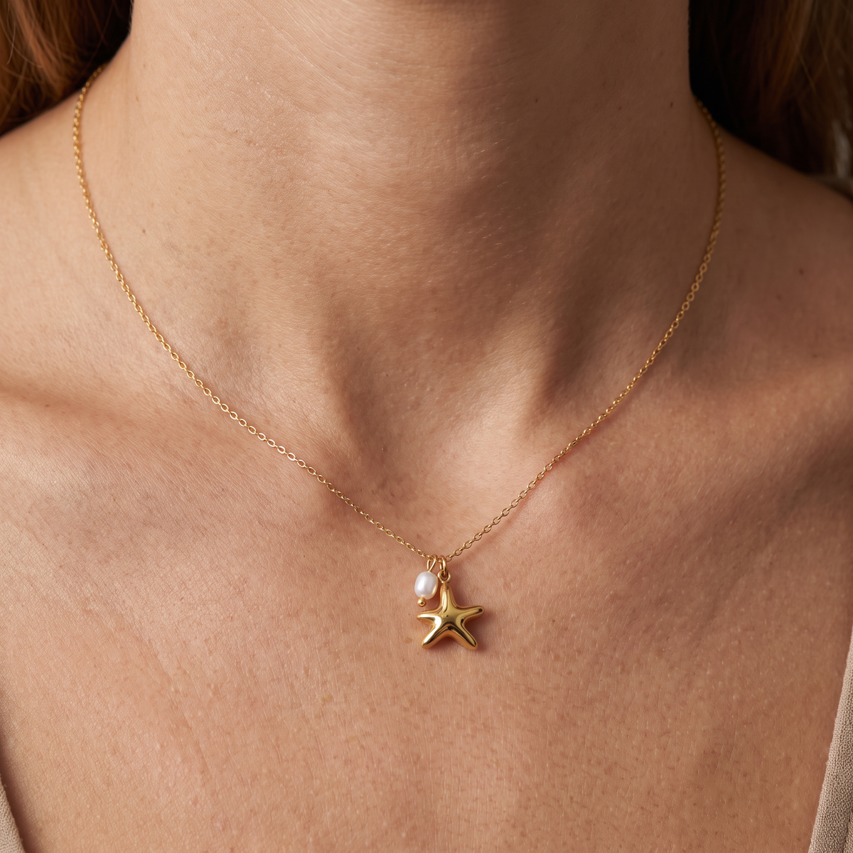 Collier ras de cou étoile de mer, porté, doré