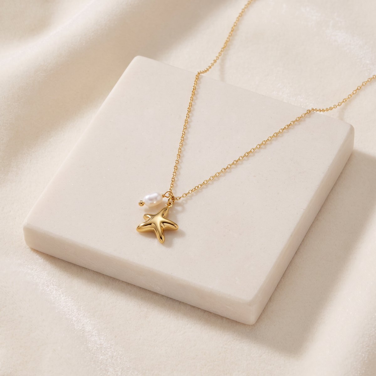 Collier ras de cou étoile de mer — Doré
